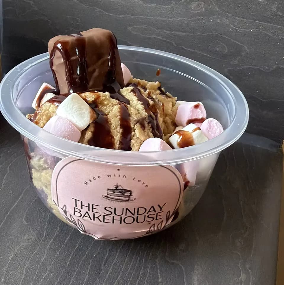 A Sunday Bakehouse cookie dough cup with marshmallows and chocolate